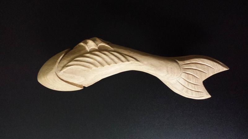 Fish shape oak pull handles from Cookson Hardware Online.